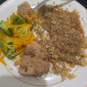 Pork Chop, Broccoli and cheese, quinoa and mushroom gravy.
