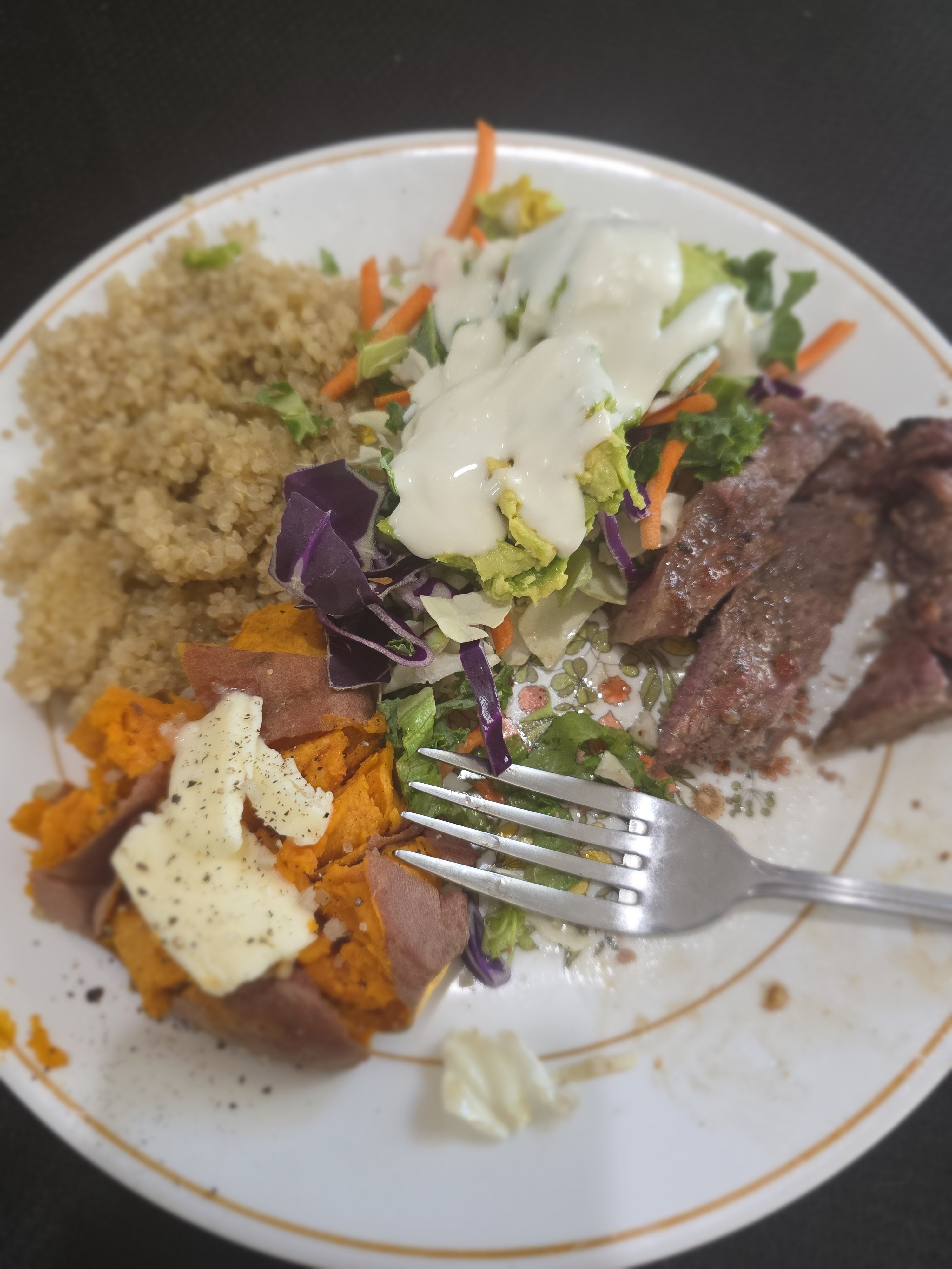 Steak, sweet potatoe and butter, celtic salt, salad, quinoa